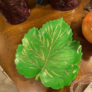 Handmade resin leaf with gold accents.